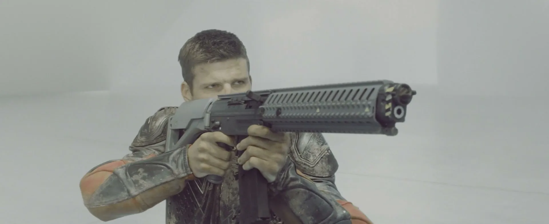 A soldier in armor aims a heavy rifle against a white misty void